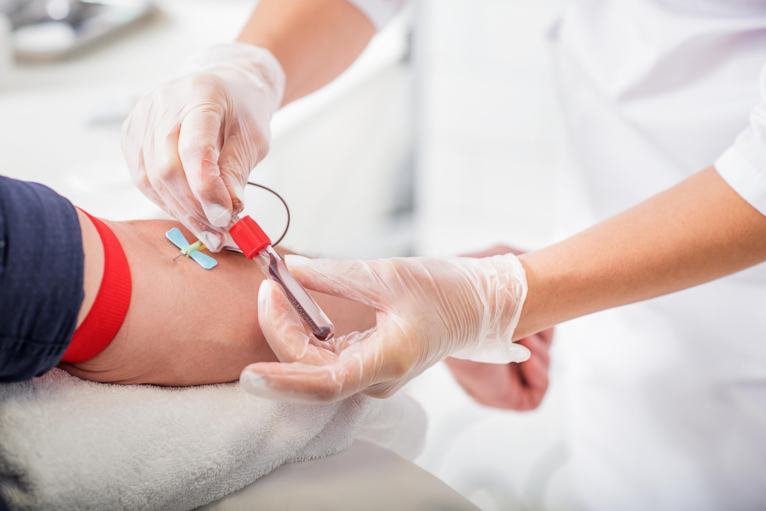 General practitioner doing blood test